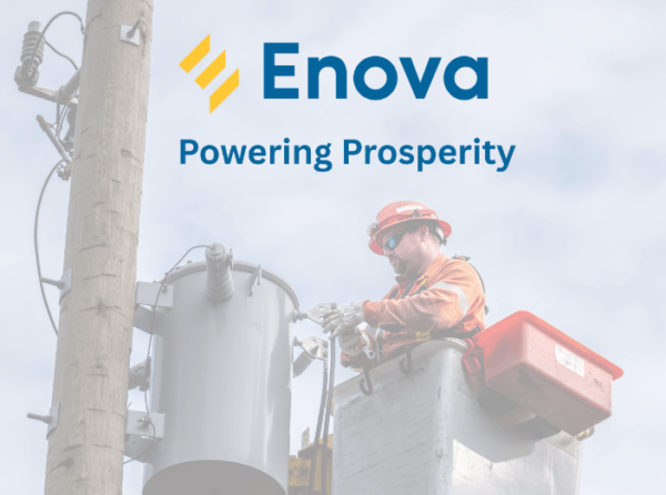 A male powerline technician in a bucket working on a power pole. The Enova logo is at the top of the image, and underneath the report title "Powering Prosperity"